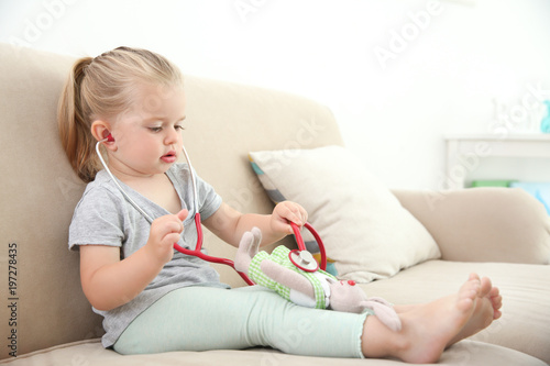 Cute little girl with steth...