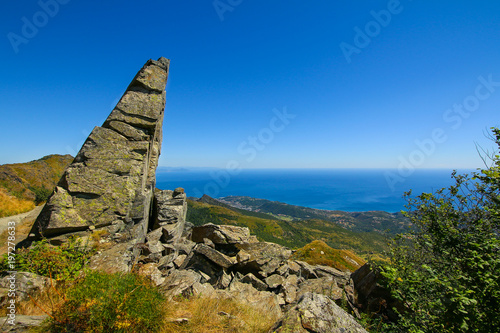 Triangular shaped rock in Beigua National Geopark, Liguria , Italy photo