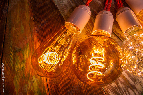 Large lamps lie on a wooden...