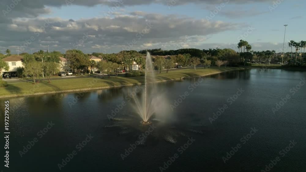 Aerial of a lake with a fountain Aerial of a lake with a fountain
