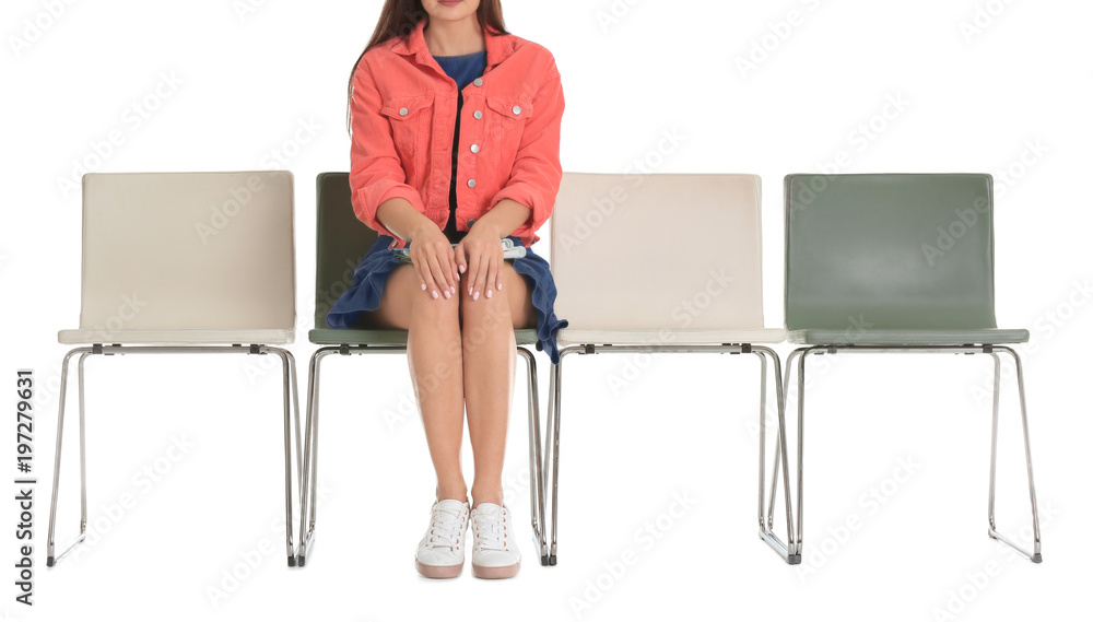 Fototapeta premium Young woman waiting for job interview on white background