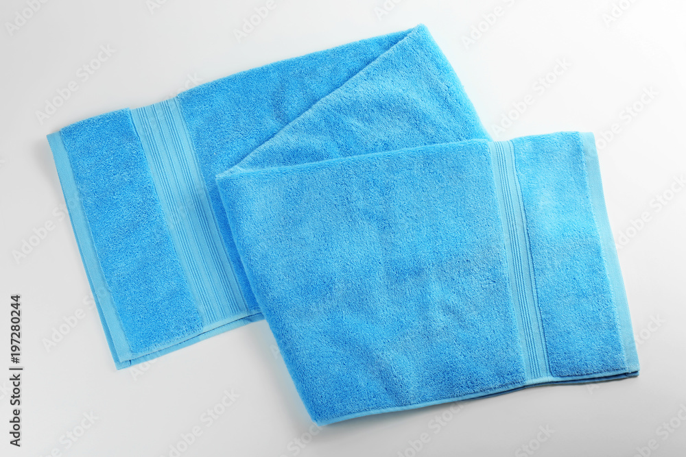 Clean soft towel on white background Clean soft towel on white background