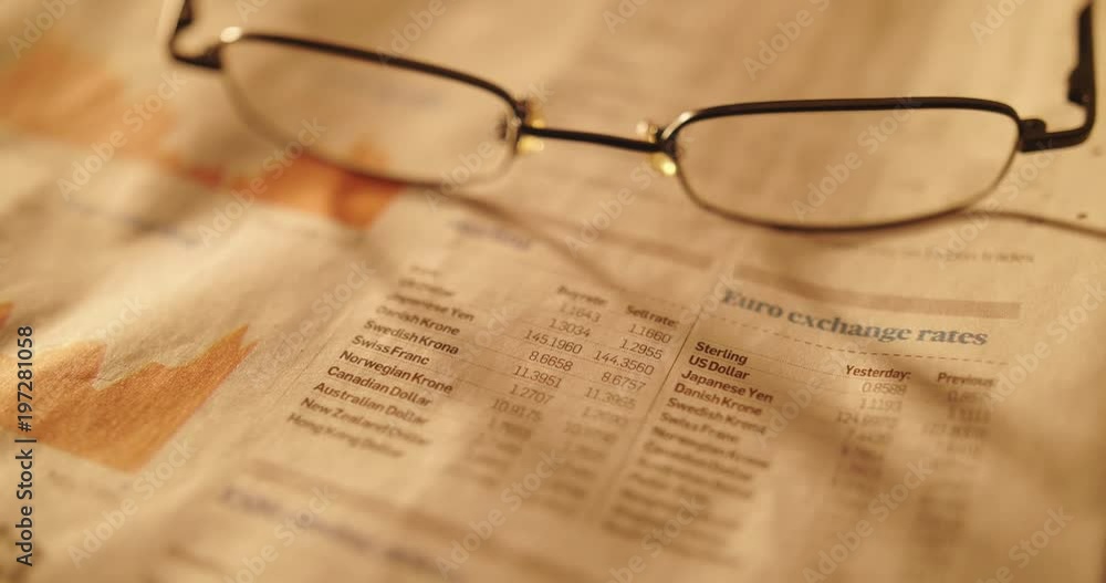 Eyeglasses On Newspaper Listing Stock Exchange Eyeglasses On Newspaper Listing Stock Exchange