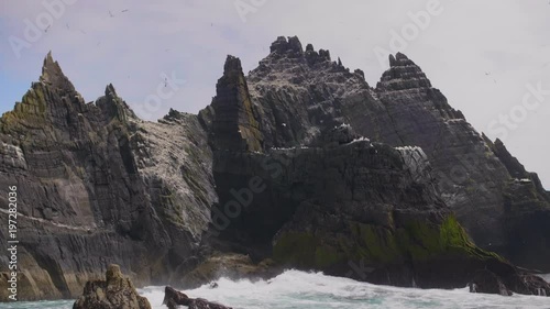 Skellig Michael Island And Waves Crashing On Its Rocky Shore
