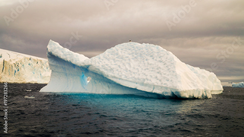 Icebergs floating around in the Errera Channel behind Cuverville Island, Antarctica. photo