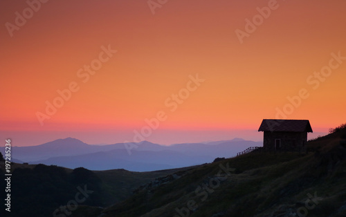 Alpine Landscape with refuge cabin and sunset light in Beigua National Geopark, Liguria, Italy