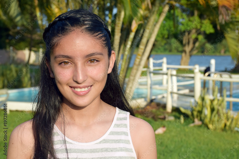 portrait of smiling girl with beautiful eyes at a park portrait of smiling girl with beautiful eyes at a park