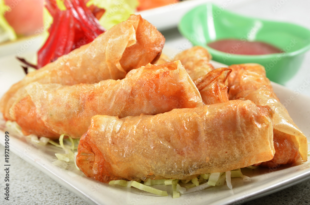 Deep fried seafood roll on plate Deep fried seafood roll on plate