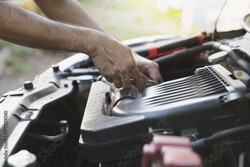 Technician check the engine daily, maintenance and repair concept