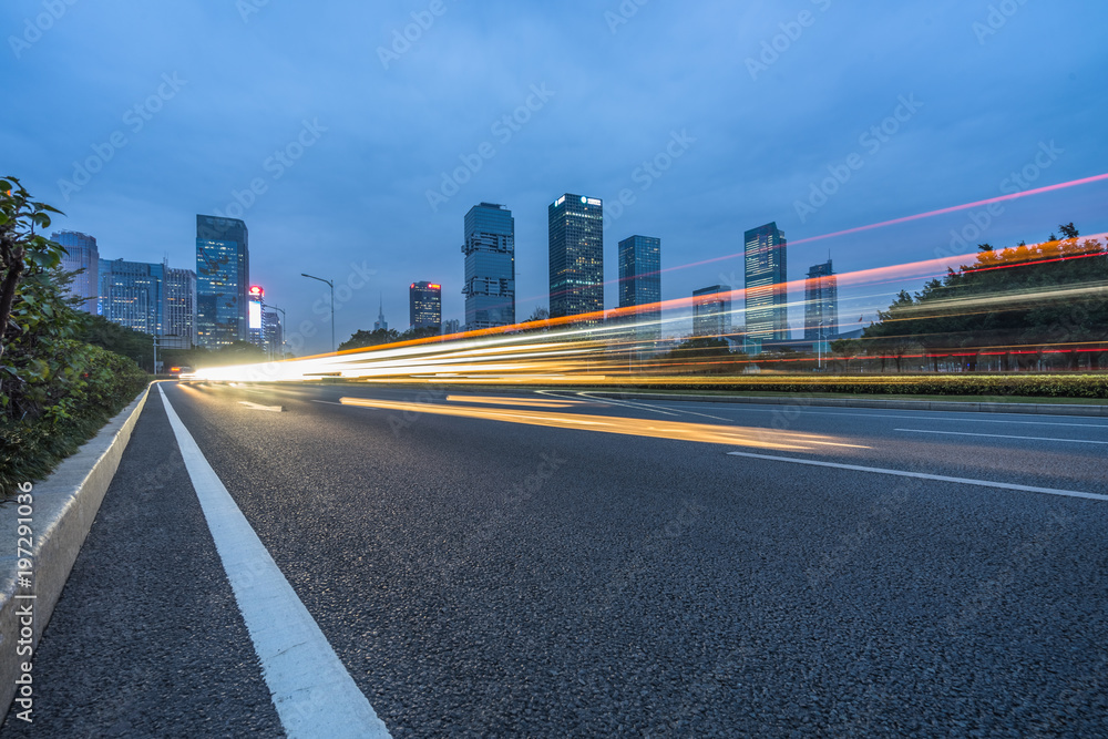 the light trails on the modern building background.