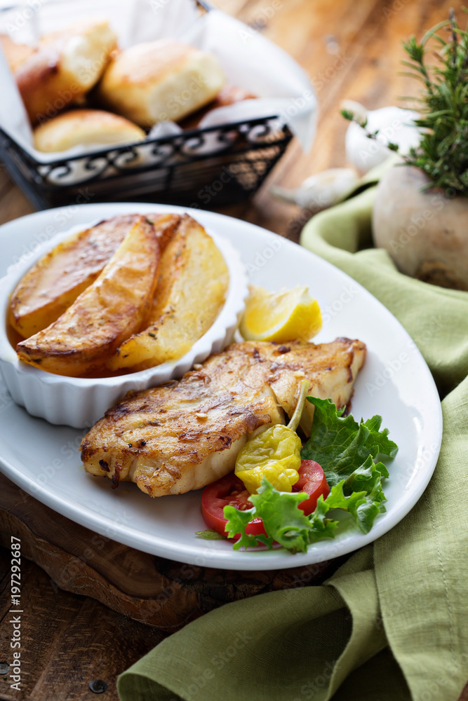 Grilled fish with roasted potatoes Grilled fish with roasted potatoes