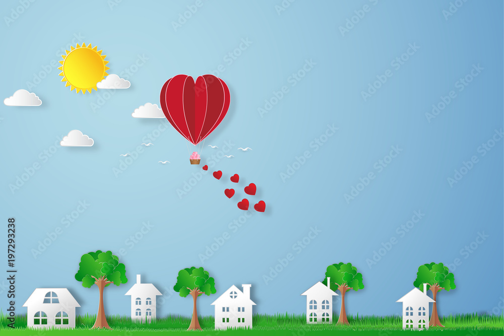 The hot air heart balloon, sun and countryside on blue sky as love, happy valentine's day, wedding and paper art concept. vector illustration.
