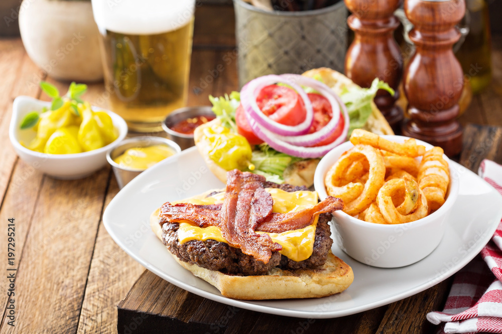 Traditional american burger with cheese and bacon Traditional american burger with cheese and bacon