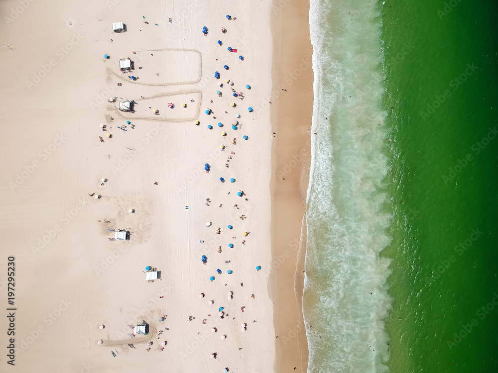 Aerial view of Copacabana beach during summer, sun with clouds Aerial view of Copacabana beach during summer, sun with clouds