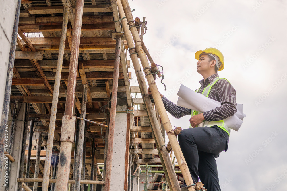 professional engineer worker at the house building construction site professional engineer worker at the house building construction site
