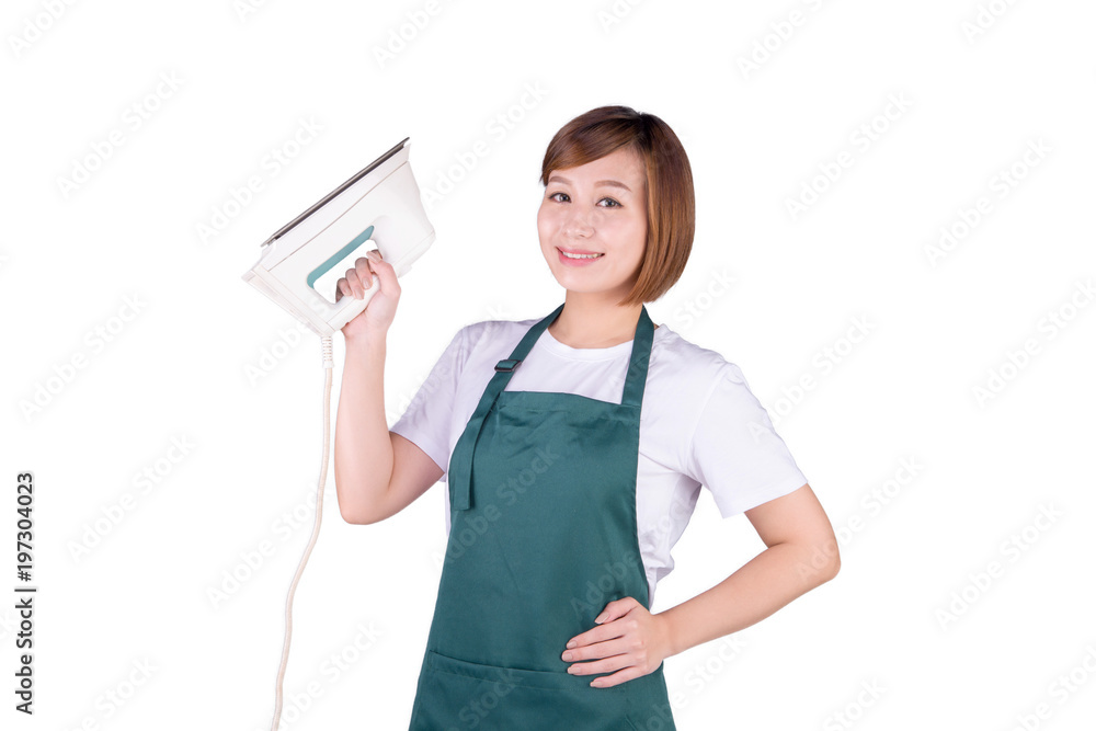 Young Asian housewife in apron hold an iron Young Asian housewife in apron hold an iron