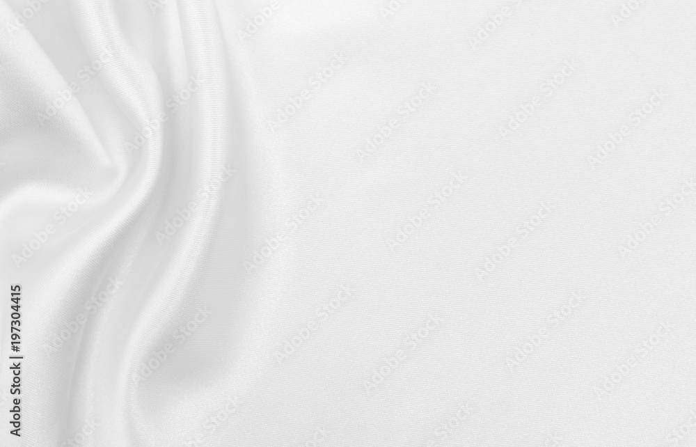 Smooth elegant white silk or satin luxury cloth texture as wedding background. Luxurious background design Smooth elegant white silk or satin luxury cloth texture as wedding background. Luxurious background design