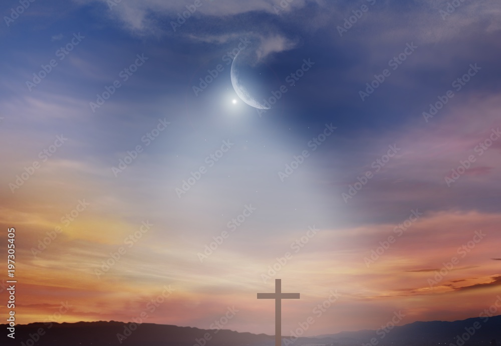 The Light of Christ Crucifix . Light of God . Light from sky . Cross on the top of the hill . Dramatic nature background .  Sunset or sunrise with clouds, light rays and other atmospheric effect . 