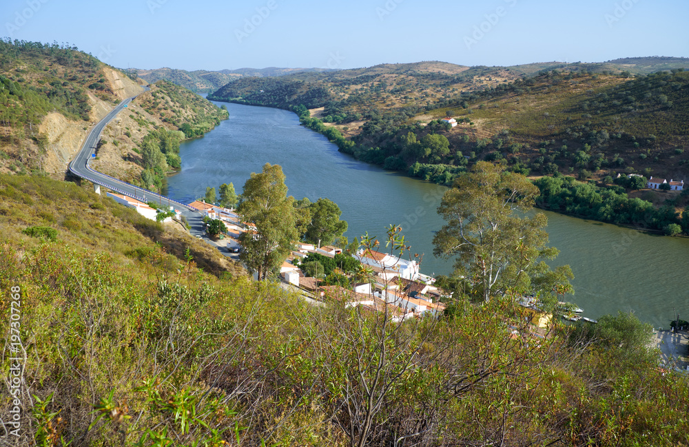 The Guadiana river near Pomarao forms the Portuguese-Spanish border. Beja. Portugal The Guadiana river near Pomarao forms the Portuguese-Spanish border. Beja. Portugal