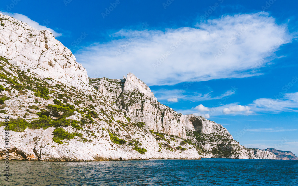 White cliffs of Massif des Calanques against blue sky in Cassis, France