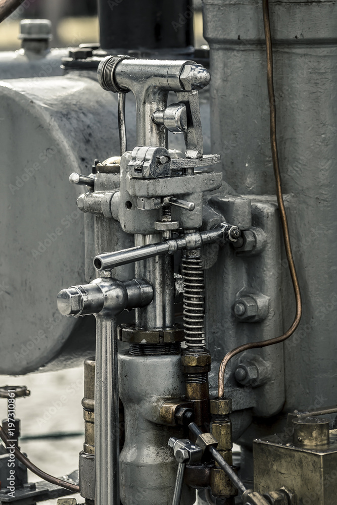Close up of the train's steam engine. Vintage look.