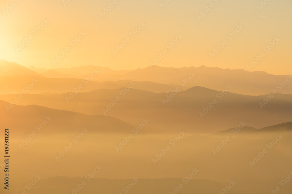 misty sunset on top the mountain
