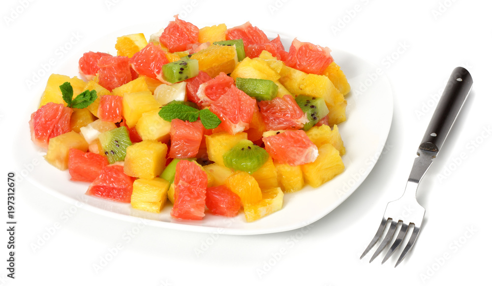 Bowl of healthy citrus fruit salad isolated on white background