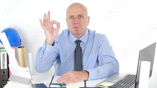 Engineer Presentation at Office Work Make OK Gesture Agreeing Hand Sign photo