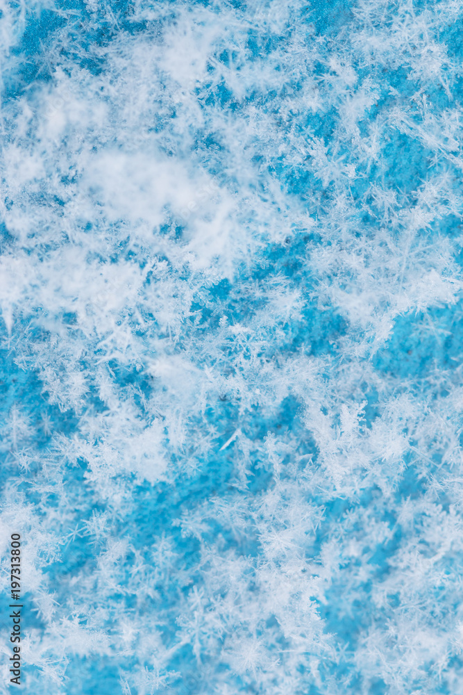 white snowflakes on a blue background