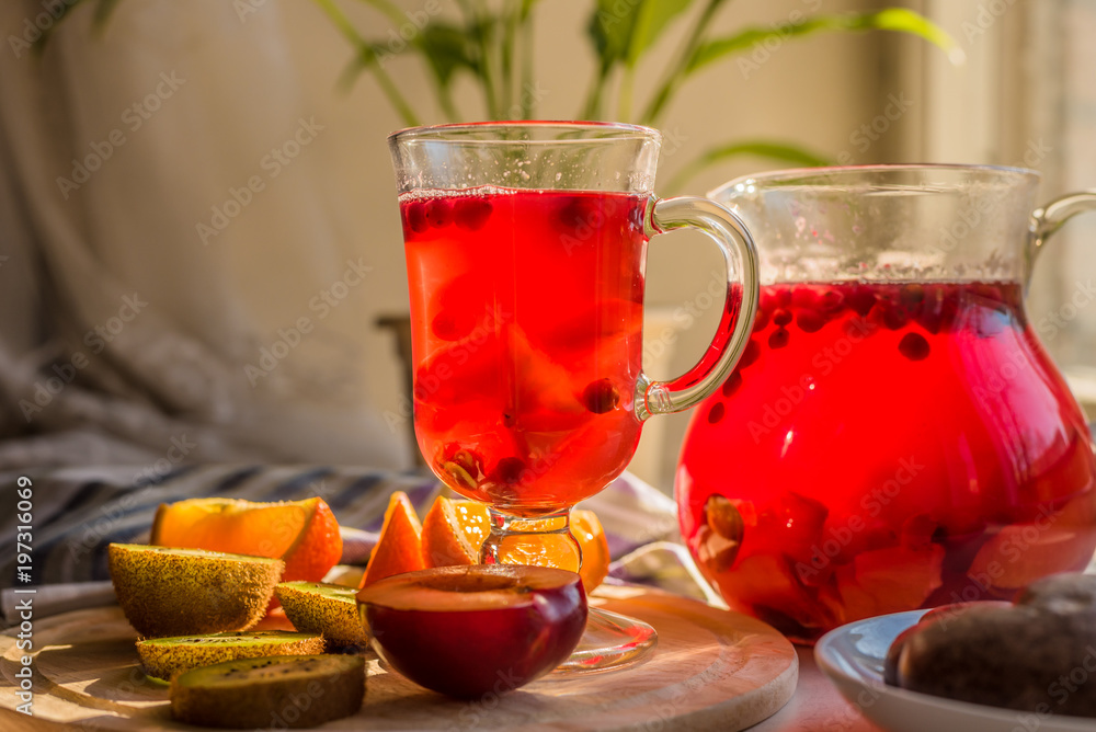 Vegetarian breakfast - fruits with pastries and a drink of cranberries and berries on a rustic background, in the morning Vegetarian breakfast - fruits with pastries and a drink of cranberries and berries on a rustic background, in the morning