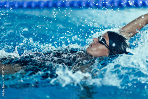 Obraz na płótnie Professional swimmer, swimming race, indoor pool