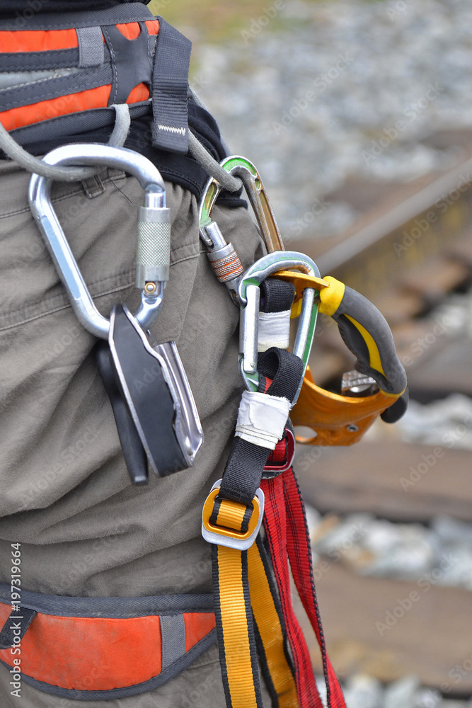 Equipment on the hip of a climber Equipment on the hip of a climber