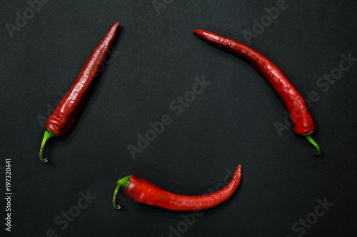 Chili pepper, red chili pepper cayenne on black background.