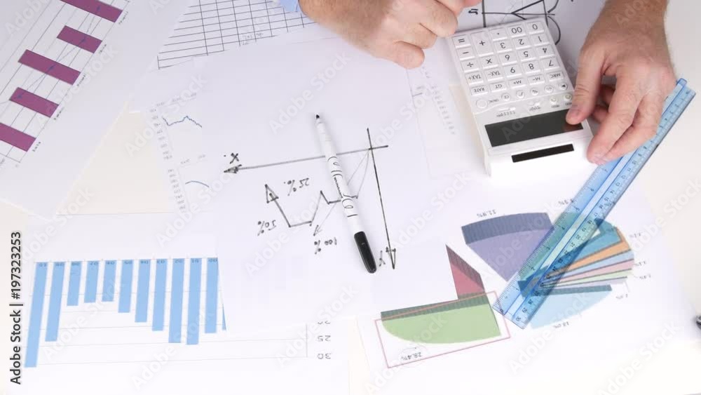 Engineer Using Adding Machine Make Calculation Charts and Scheme Engineer Using Adding Machine Make Calculation Charts and Scheme
