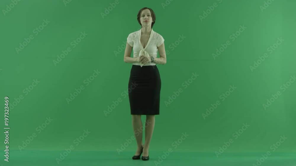 A business woman is waiting for something on the green screen A business woman is waiting for something on the green screen