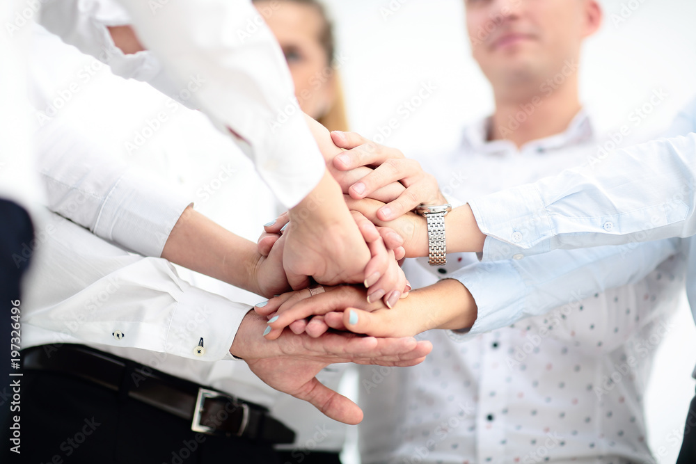 concept of teamwork. business people joined hands concept of teamwork. business people joined hands