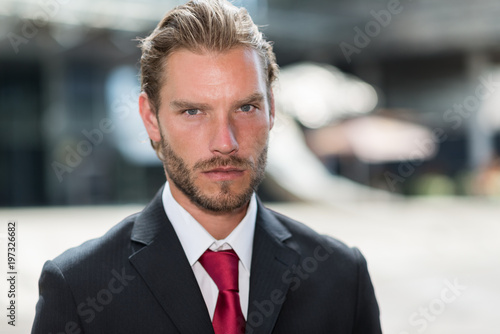 Handsome businessman portrait © Minerva Studio