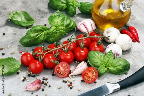 tomato and italian ingredient. Ripe tomatoes with fresh basil  garlic