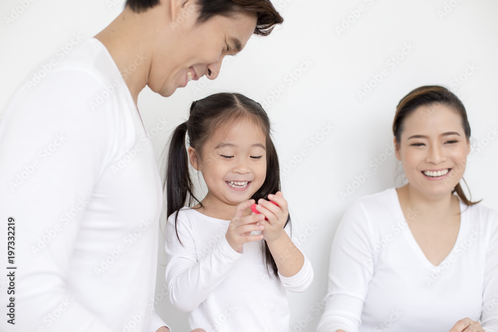 Portrait of Happy family play clay together at home. People lifestyle concept. Portrait of Happy family play clay together at home. People lifestyle concept.