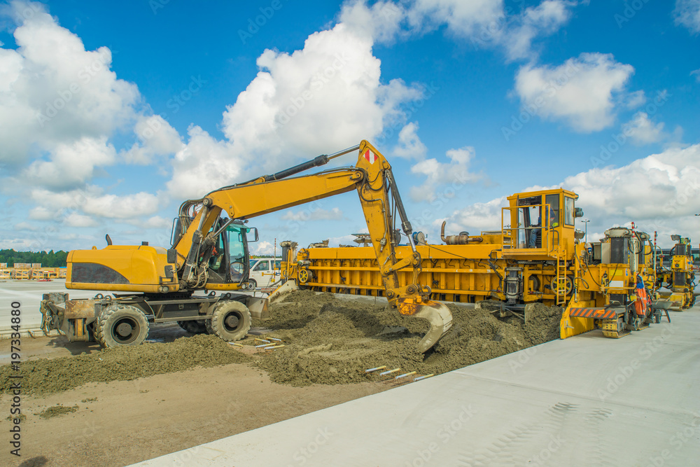 Fototapeta premium Technique for pouring concrete at the aerodrome.