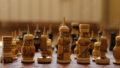black and white chess figures on chessboard