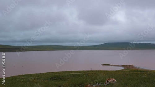 Russia, time lapse. The movement of clouds in the spring in the steppe part of the Crimea peninsula at Cape Opuk.
 photo