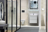 Piękna nowoczesna łazienka z kabiną prysznicową, lustrem, umywalką i muszlą.