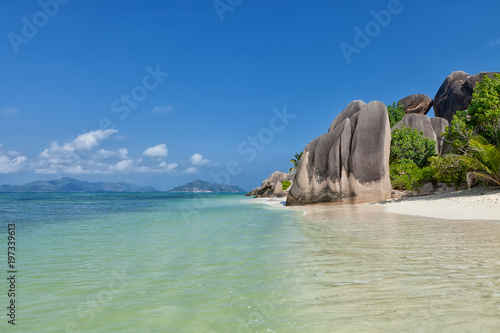 Anse Source d'Argent - granite rocks at beautiful beach on tropical island La Digue in Seychelles