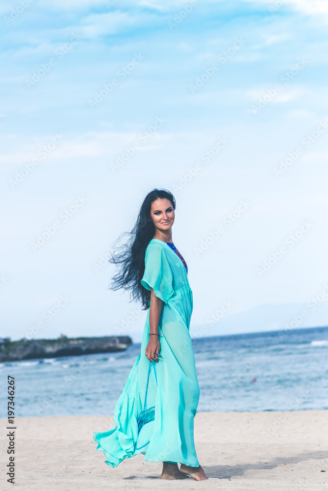Sexy young woman posing on the tropical beach of Bali island, Indonesia. Asia. Sexy young woman posing on the tropical beach of Bali island, Indonesia. Asia.