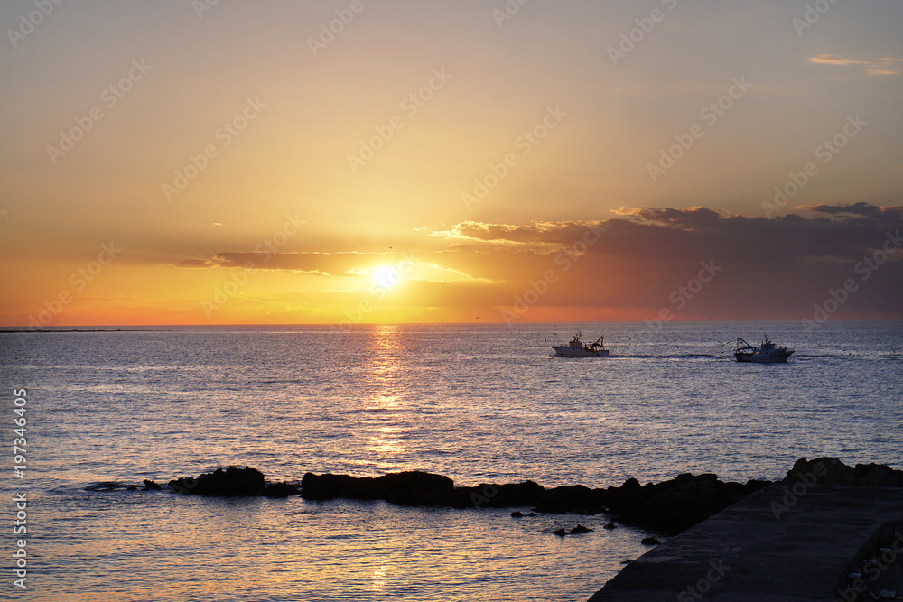 Sunset in Gallipoli with fishing boats