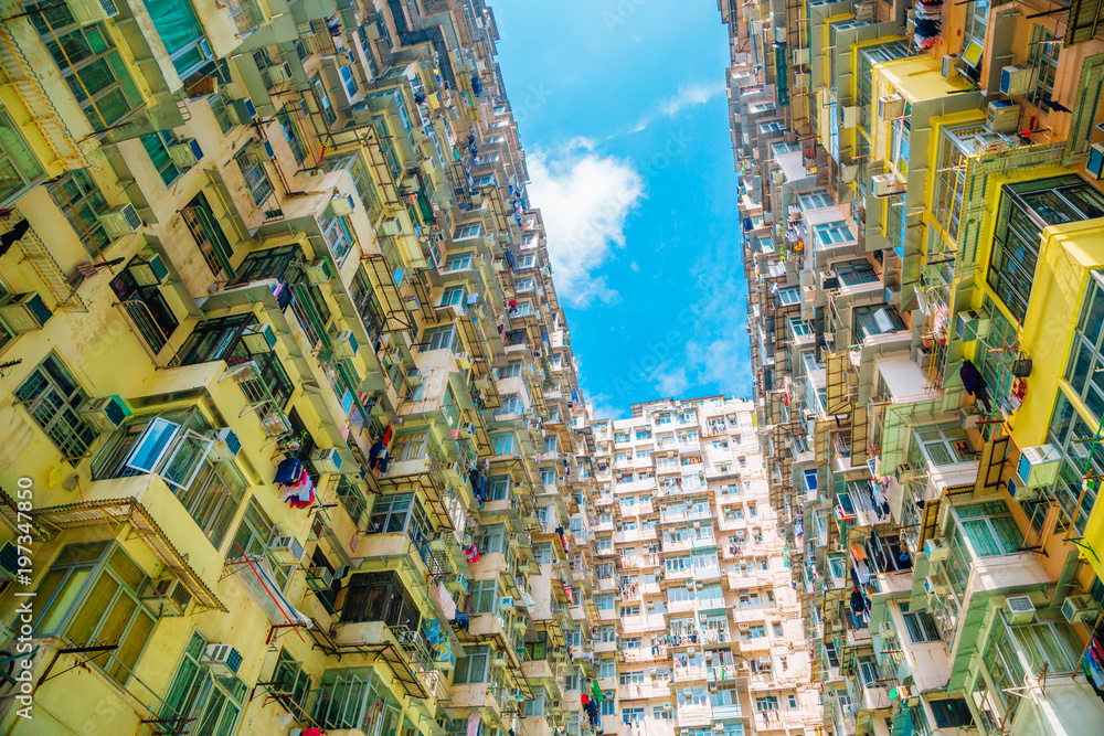 Old residential building under blue sky at Quarry Bay, Hong Kong