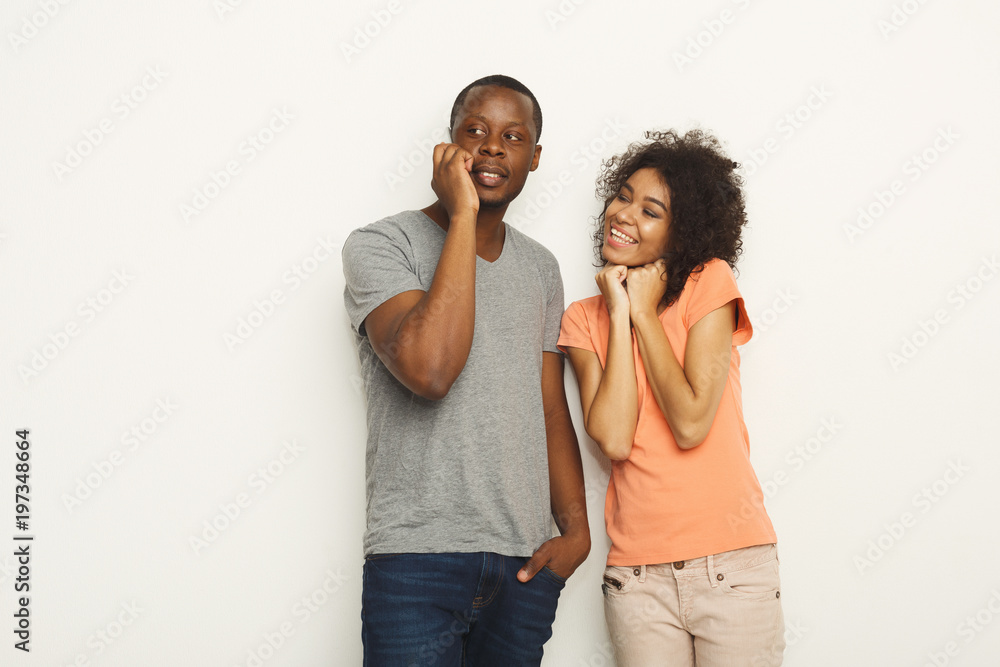 Naklejka premium Young black couple on white studio background