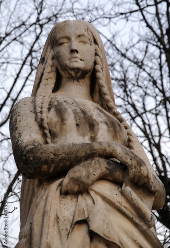 Sainte Geneviève (Saint Genevieve) by Michel Mercier (1810-1894); one of the twenty marble statues of French queens and illustrious women in the public Jardin du Luxembourg (Luxembourg Garden), Paris