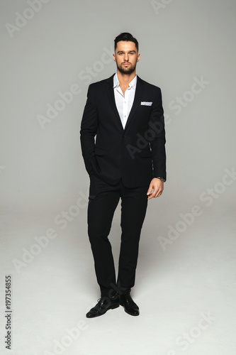 Handsome man in black suit photo